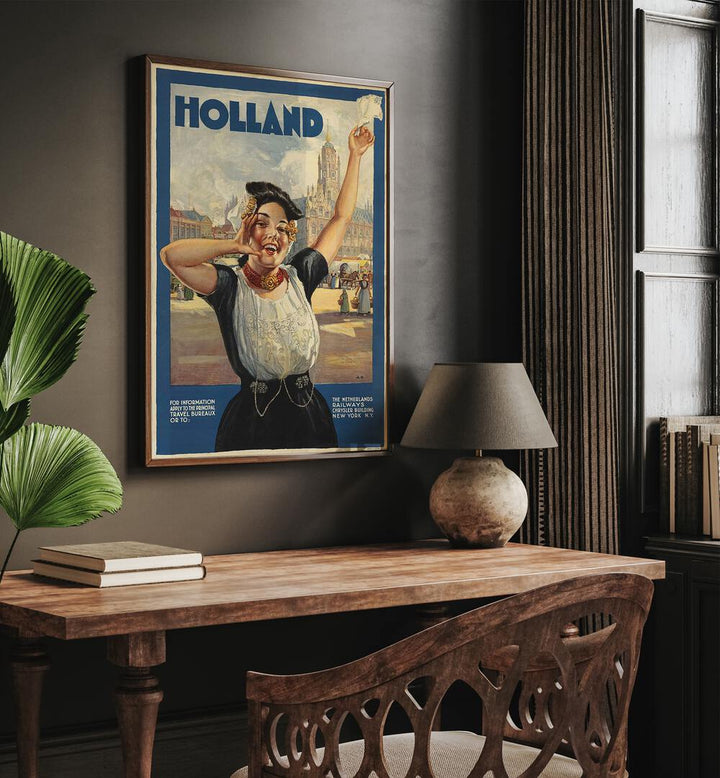 Holland Retro Vintage Travel Vintage Travel Posters in Dark Wood Plain Frame on a wall above a study table beside a plant