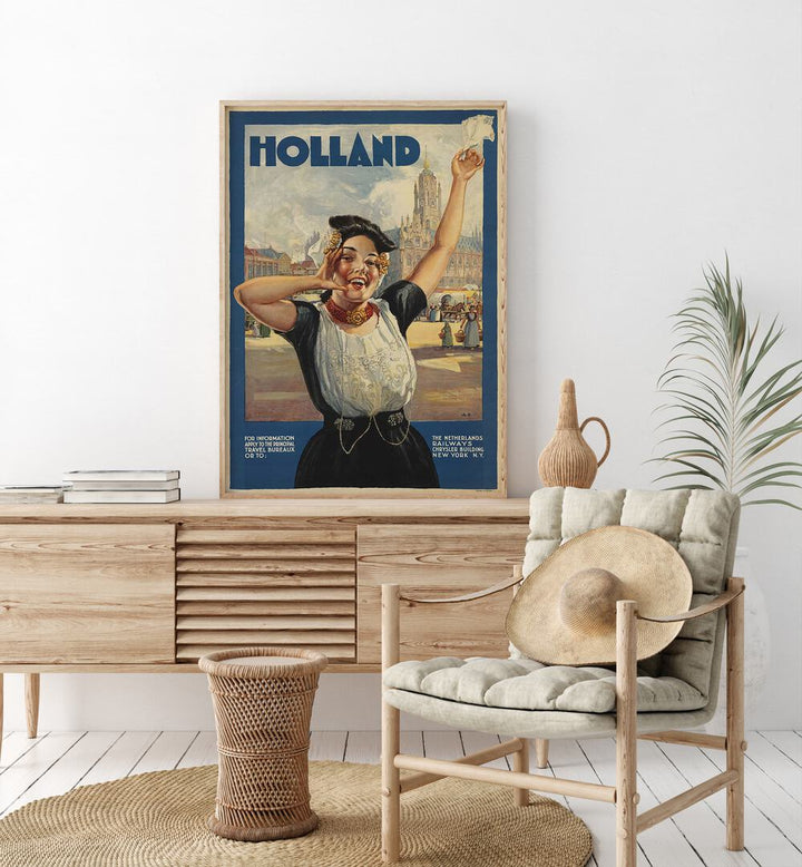 Holland Retro Vintage Travel Vintage Travel Posters in Oak Wood Plain Frame on a console table beside a plant