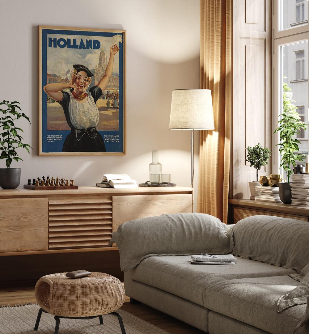 Holland Retro Vintage Travel Vintage Travel Posters in Oak Wood Plain Frame on a wall above a console table beside a lamp