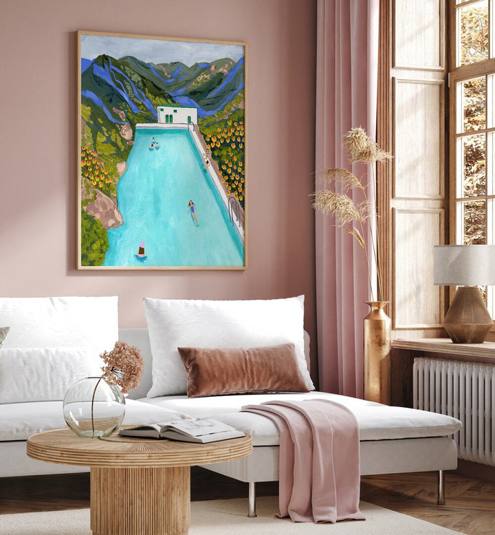 Hotsprings By Sarah Gesek Wall Art Prints in Oak Wood Plain Frame placed on a living room wall beside a window and behind a sofa