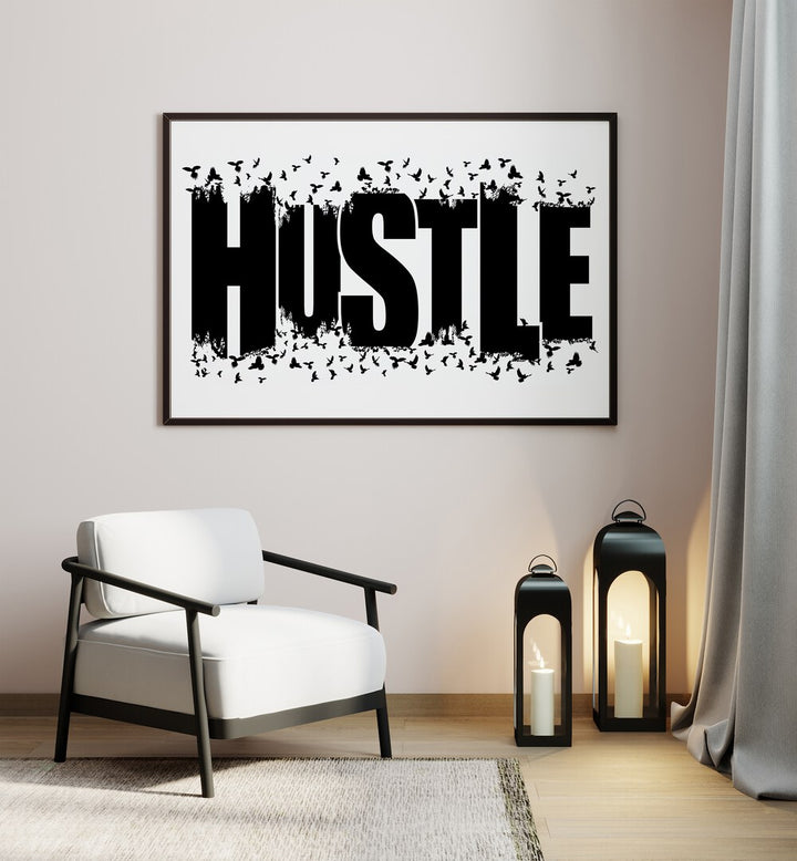 Hustle for Freedom Quotes and Typography Posters in Black Plain Frame placed on a wall beside a chair