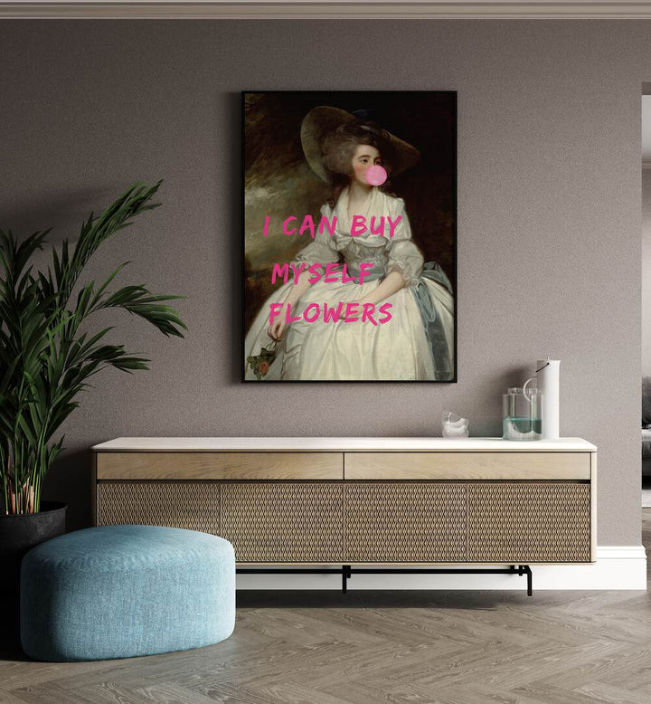 I Can Buy Myself by the Art Concept Altered Art Prints in Black Plain Frame placed on a wall behind a console table