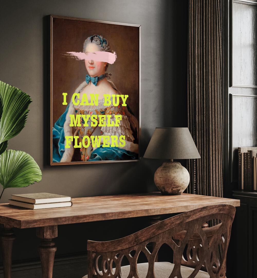 I Can Buy Myslef Flowers by Grace Digital Art Co Altered Art Prints in Dark Wood Plain Frame placed on a wall behind a study table