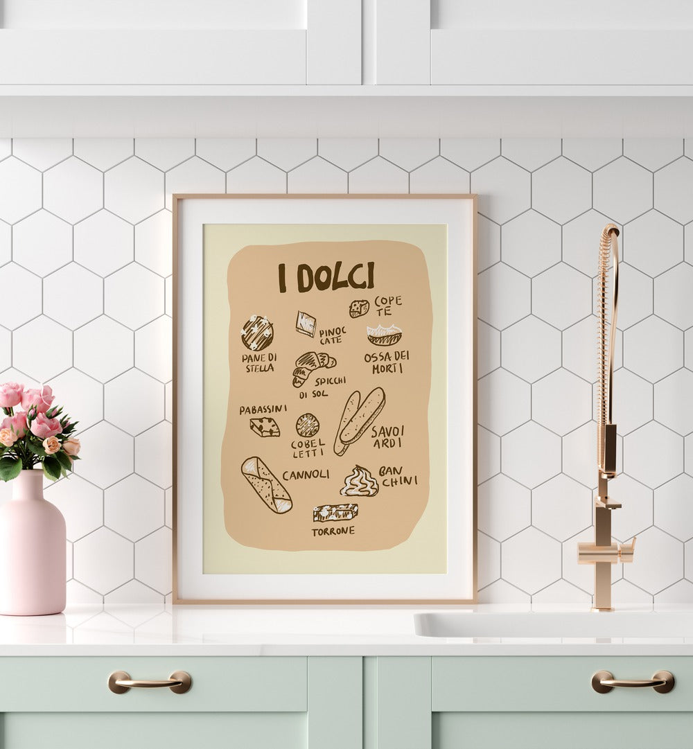 I Dolci by Studio Dolci Kitchen Art Prints in Oak Wood Frame With Mount placed on a kitchen counter for kitchen