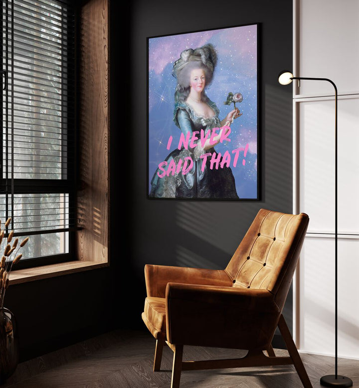 I Never Said That By Grace Digital Art Co Altered Art Prints in Black Plain Frame placed on a wall beside an orange sofa