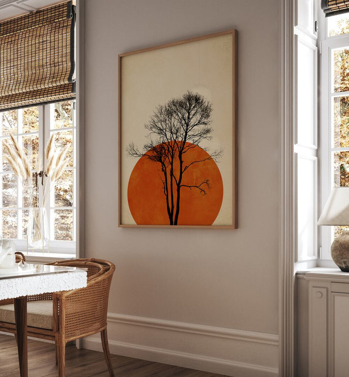 In The Wilderness Landscape Art Artwork in Oak Wood Plain Frame Placed on a Cream Colored Wall near a Dinning Table in the Dinning Room