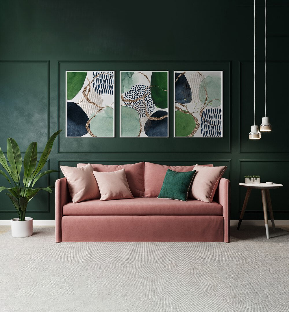 Vibrant INDIGO GREEN GLITTER SET, SET OF 3 PAINTINGS enhancing a stylish living room decor with a touch of sparkle.