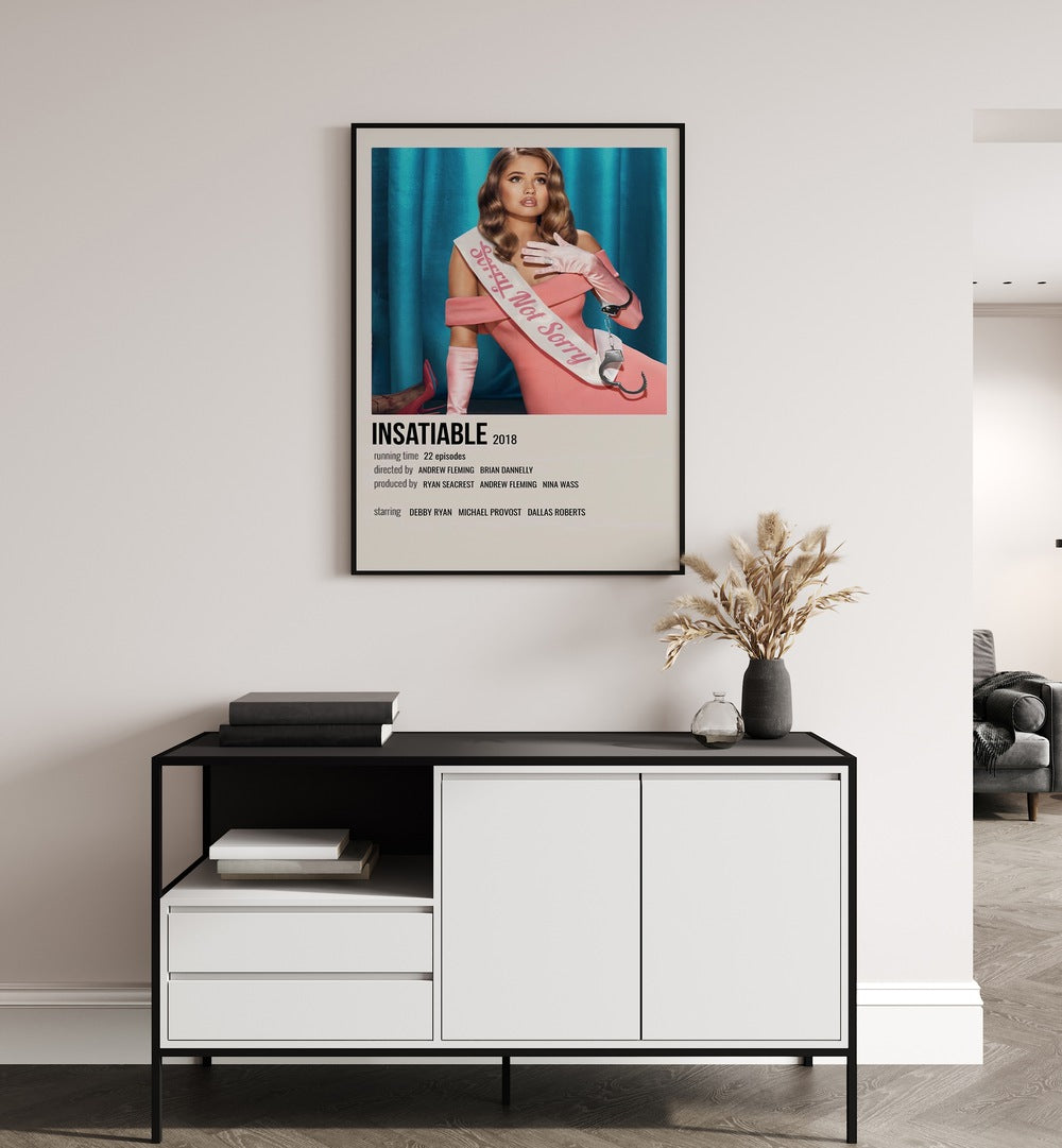 INSATIABLE 2018 MOVIE POSTERS in Black Plain Frame hanging on wall above study table