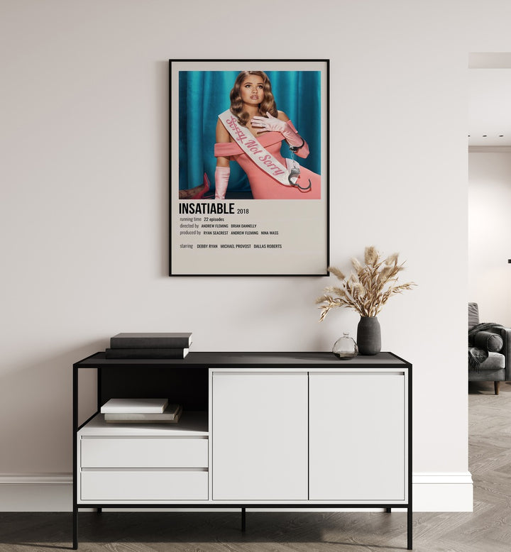 INSATIABLE 2018 MOVIE POSTERS in Black Plain Frame hanging on wall above study table