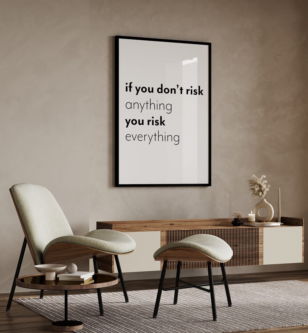 If You Dont Risk  By 1 X Studio Quotes And Typography Posters in Black Plain Frame placed on a Beige Colored Wall above a Console Table in the Drawing Room