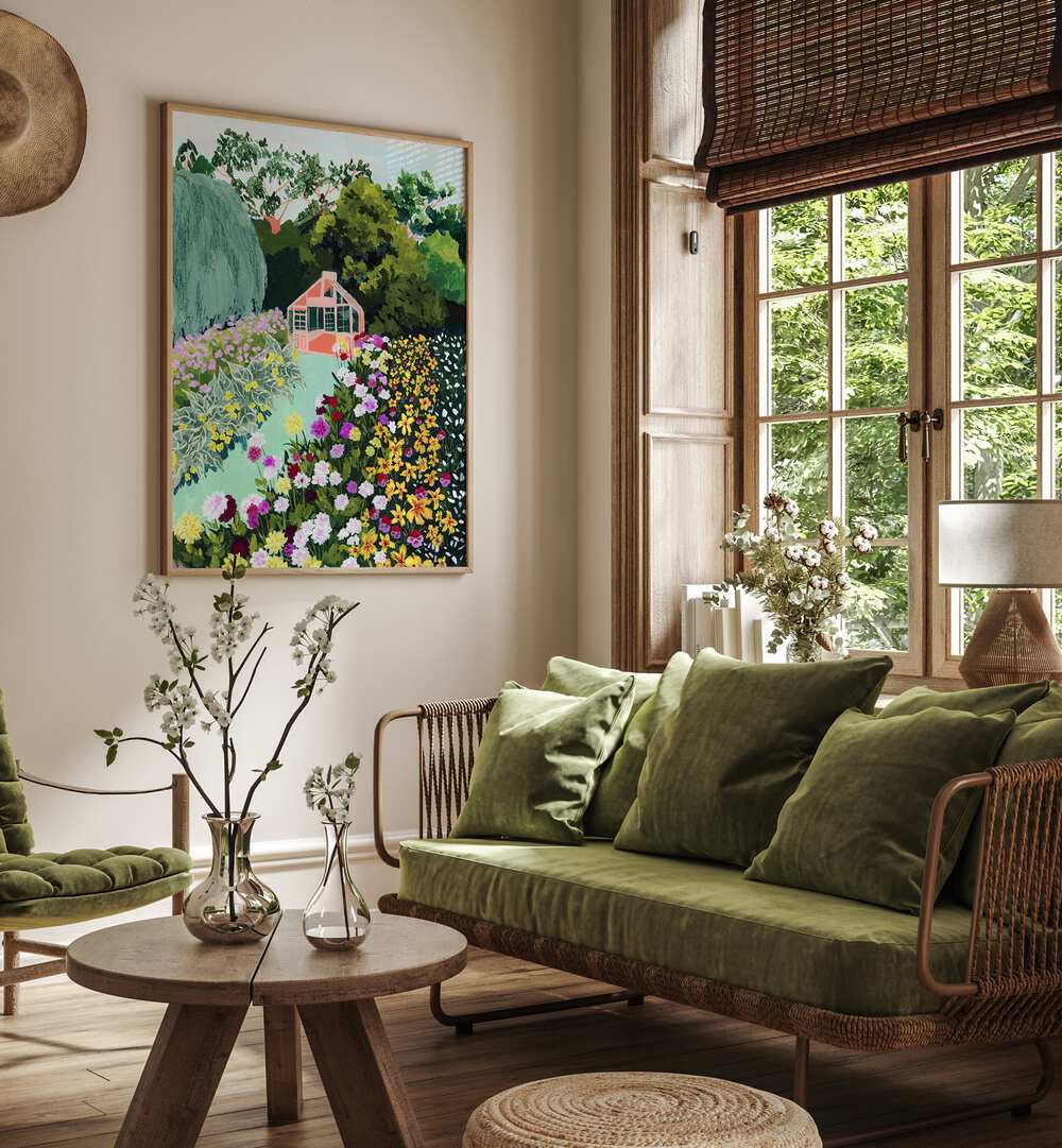 In Bloom By Sarah Gesek Wall Art Prints in Oak Wood Plain Frame placed on a living room wall beside a window and a sofa