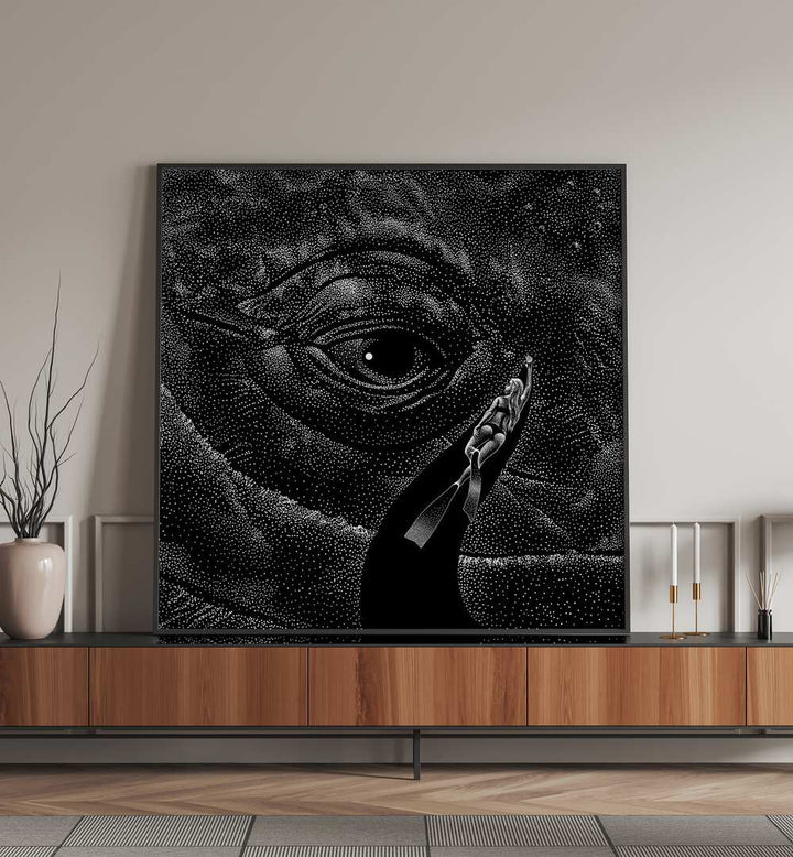 In The Whales Eye Black Version By Aliriza Cakir Surreal Paintings Surreal Art in Black Plain Frame placed on a Console Table near a White Colored Wall in the Living Room