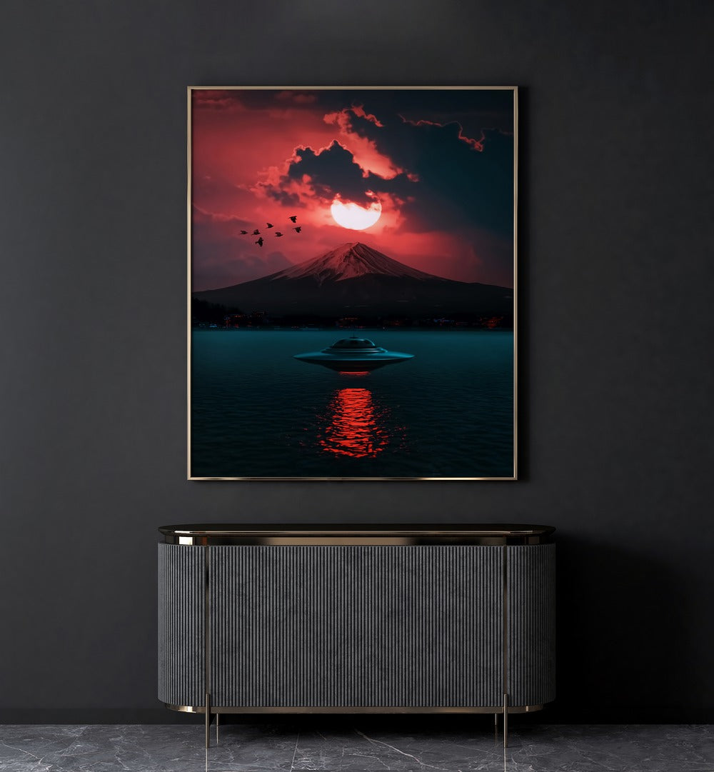 Incoming UFO By Ritvik Takkar Surreal Art Prints in Gold Plain Frame placed on a Dark Grey Colored Wall above a Console Table in the Drawing Room