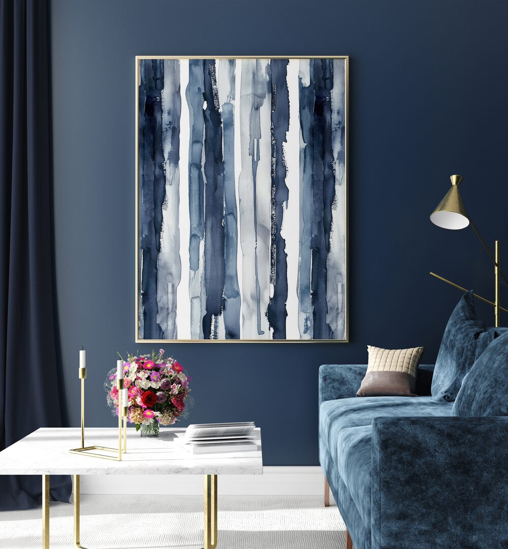 Indigo Waves Beach Prints Coastal Wall Art in Oak Wood Plain Frame placed on a wall beside a sofa and a table