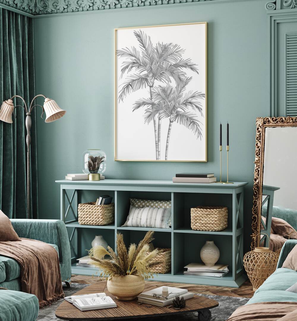 Ink Palm Promenade Beach Prints Coastal Wall Art in Oak Wood Plain Frame placed on a green wall behind a console table 