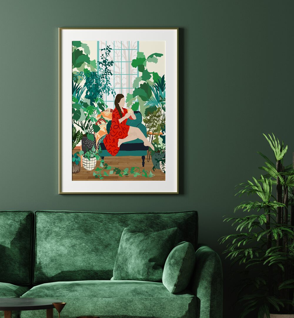 Introspection By Uma Gokhale Woman Illustration Art Prints in Oak Wood Frame With Mount behind a green sofa on a green wall