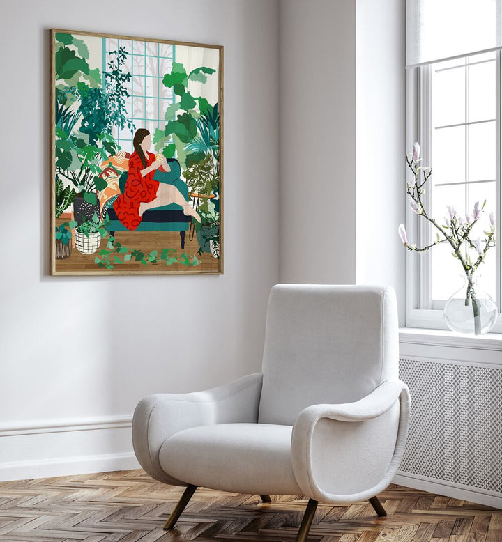 Introspection By Uma Gokhale Woman Illustration Art Prints in Oak Wood Plain Frame beside a white sofa on a wall