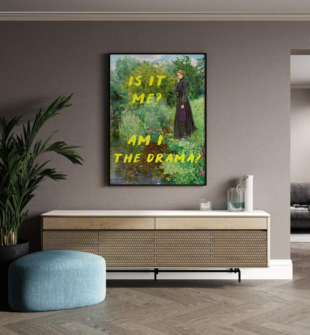 Is It Me, Am I the Drama by the Art Concept Altered Art Prints in Black Plain Frame placed on a wall behind a console table