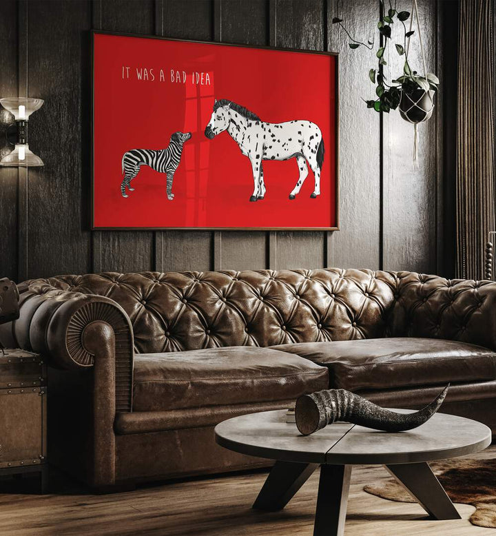 It Was A Bad Idea By Balazs Solti Kids Room Art in Dark Wood Plain Frame placed on a dark  Wooden Textured Wall behind a Brown  Leather Sofa in the Living Room