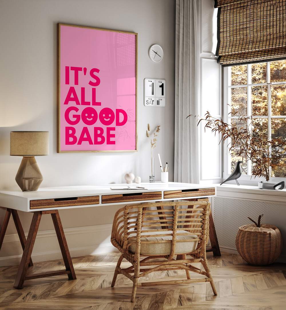 Its All Good Babe by Athene Fritsch Quotes and Typography Posters in Oak Wood Plain Frame placed on a wall behind a study table and beside a window