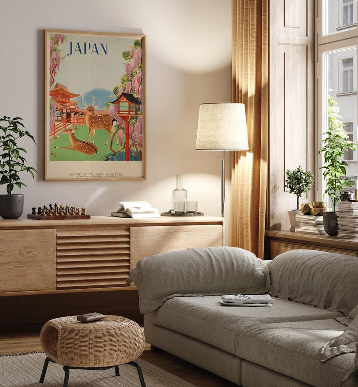 Japan Retro Art I  Vintage Travel Posters in Oak Wood Plain Frame placed on a wall behind a console table