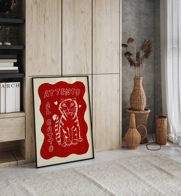 Katze Up Vita by Studio Dolci Kitchen Art Prints in Black Plain Frame placed on a floor beside a window