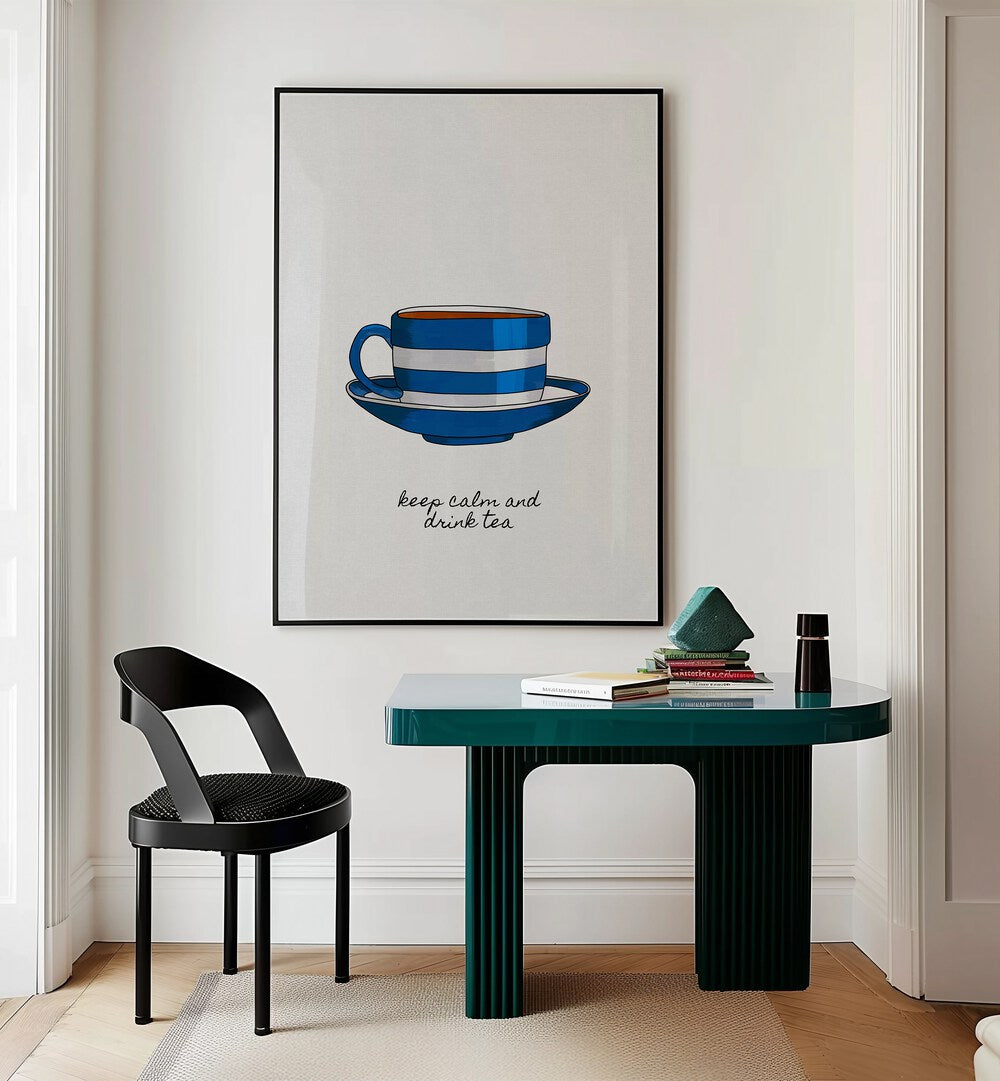 Keep Calm And Drink Tea By Orara Studio Kitchen Posters Kitchen Art Prints in Black Plain Frame placed on a Cream Colored Wall near a Table in a Workspace in the Drawing Room