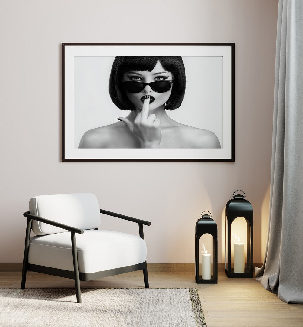 Kiss This by David Drake Fine Art Photography Fashion Photography in Black Frame With Mount placed on a wall behind a chair and a lamp