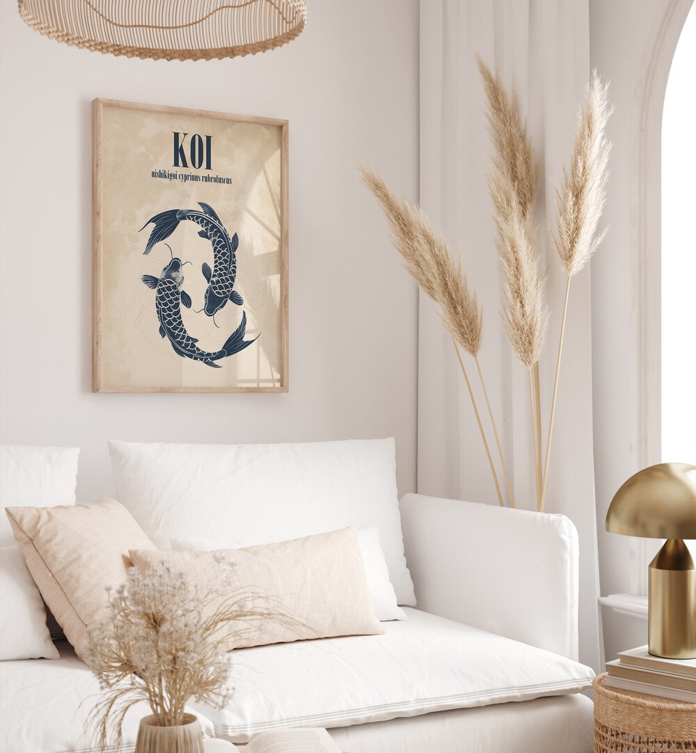 Koi Beach Prints Coastal Wall Art in Oak Wood Plain Frame placed on a white wall behind a sofa