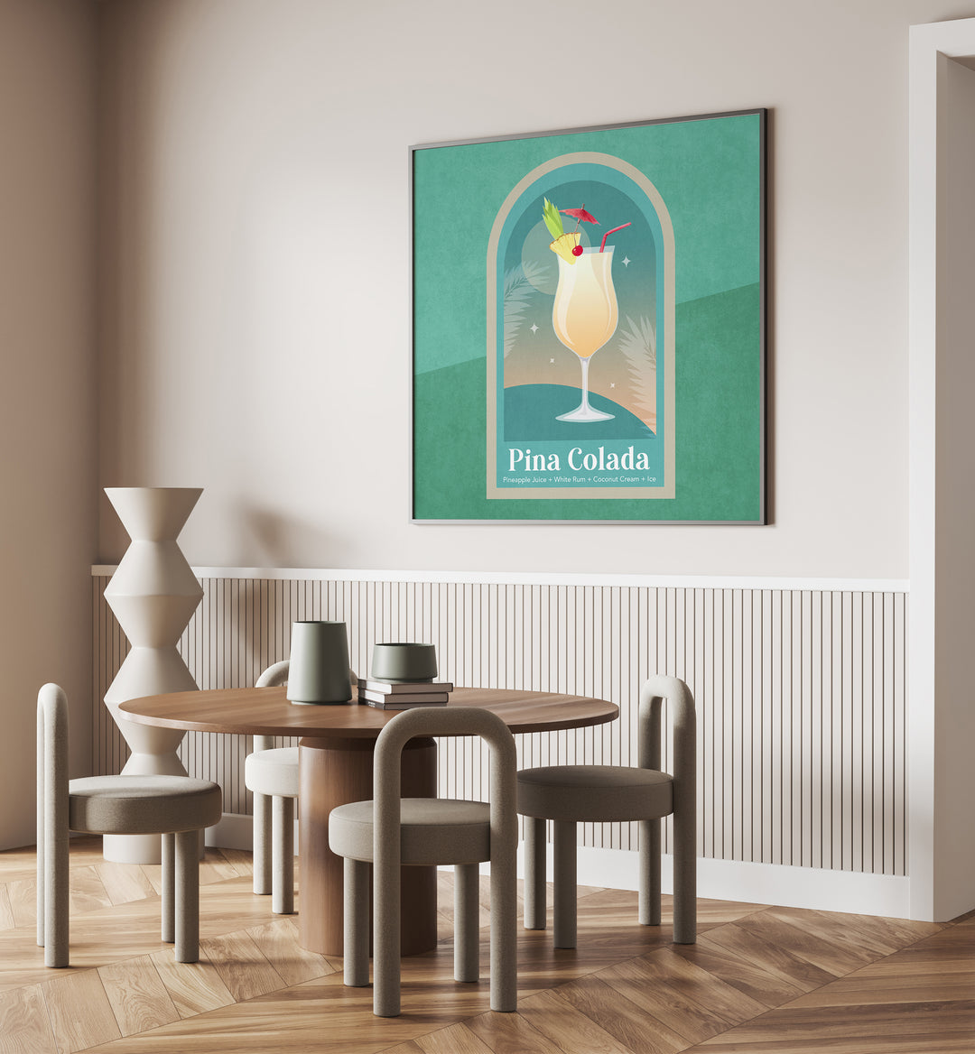 Kokteyl Pina Colada By Emel Tunaboylu Bar Posters Bar Art Prints in Black Plain Frame placed on a Cream Colored Wall near a Coffee Table in the Dining Room