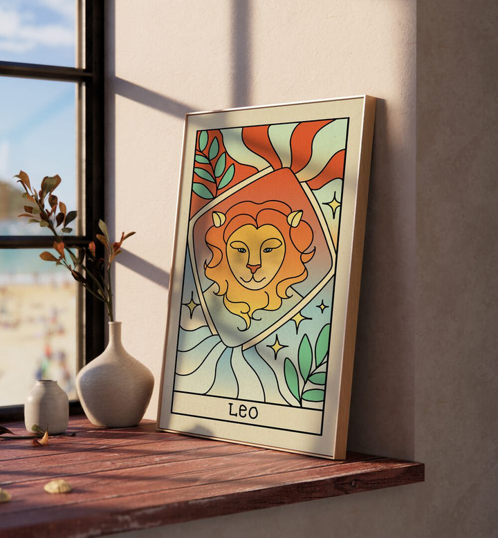 Leo Zodiac & Tarot Art Painting Artwork in plain oakwood frame beside a window