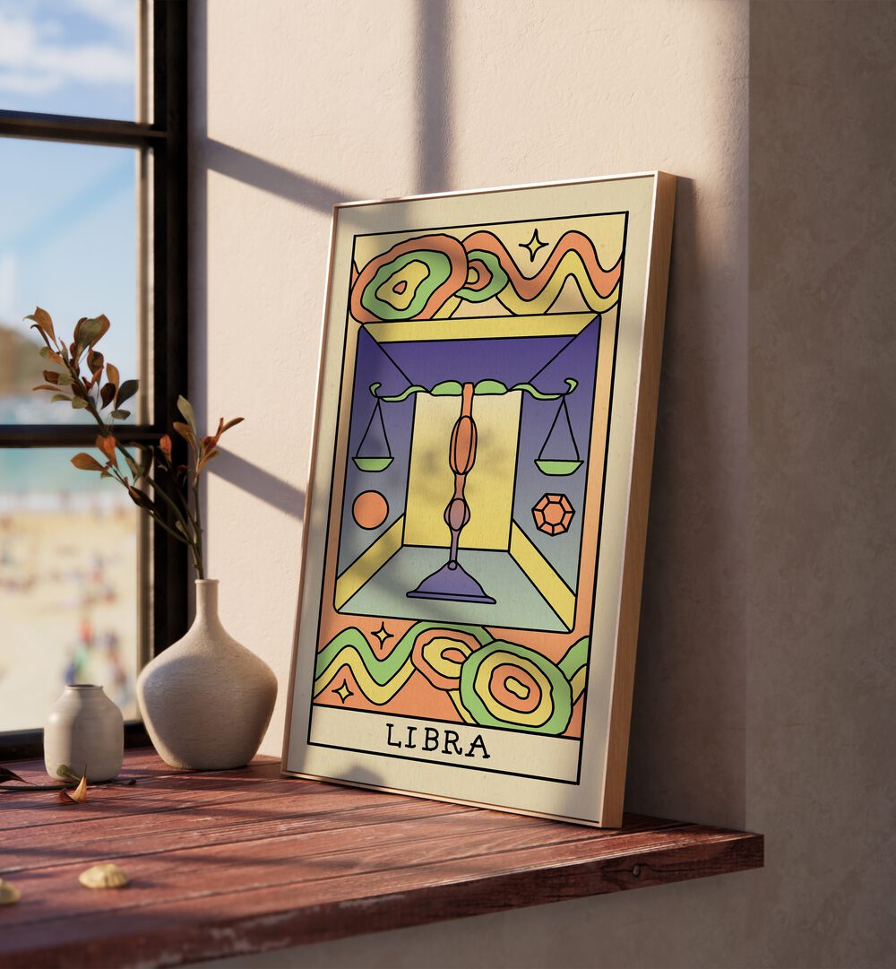 Libra Zodiac & Tarot Art Painting Artwork in plain oakwood frame beside a window