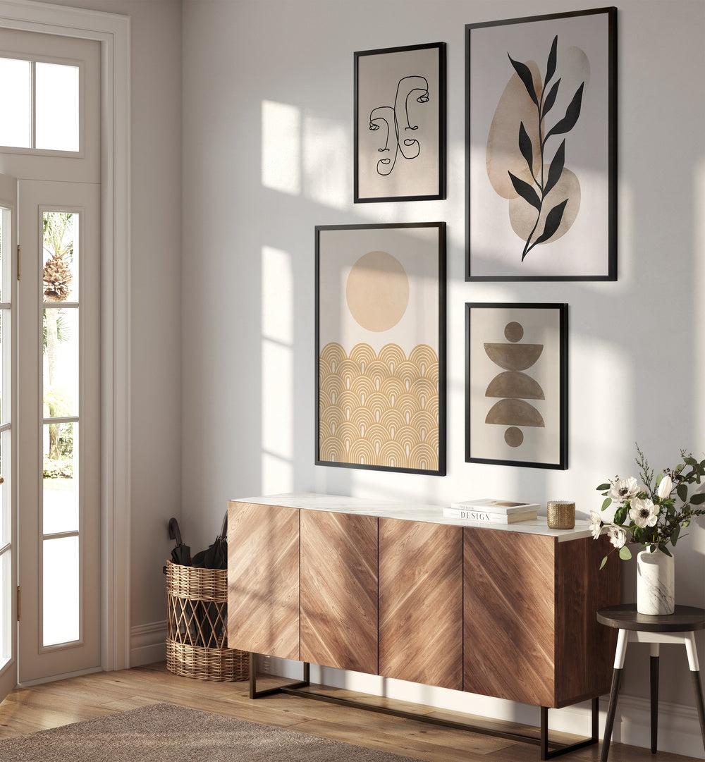 Stylishly arranged LINES & LEAVES GALLERY WALL featuring botanical art, enhancing minimalist home decor elegance.