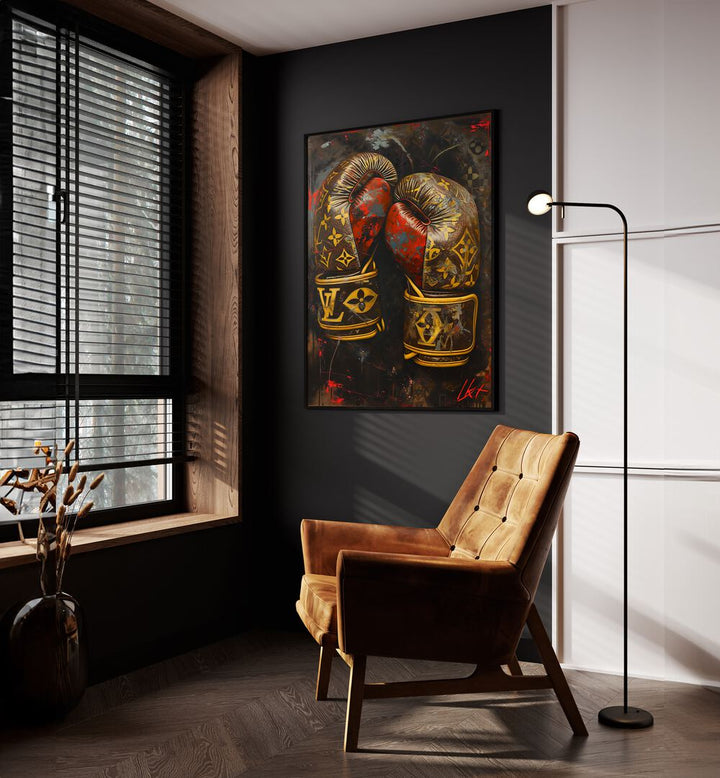 LV Boxing Gloves Gaming Posters in Black Plain Frame placed on a Dark Grey Colored Wall near a Brown Sofa Chair in the Drawing Room