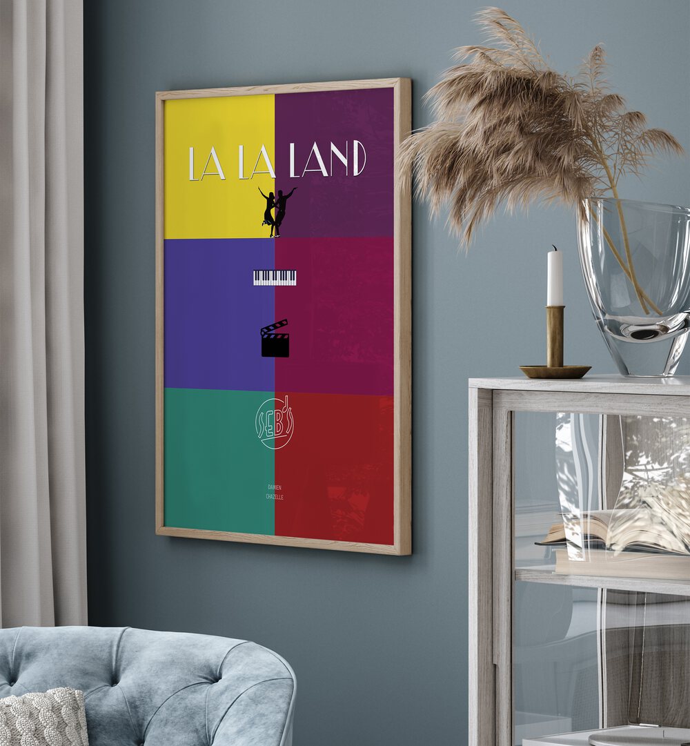 La La Land By Grishma Korjani Movie Posters in Oak Wood Plain Frame placed on a Blue Colored Wall in the Living Room