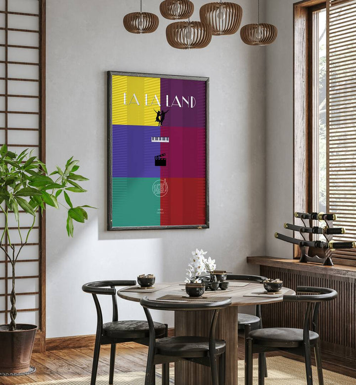 La La Land By Grishma Korjani Movie Posters in Dark Wood Plain Frame placed on a Cream Colored Wall near a Dining Table in the Dining Room