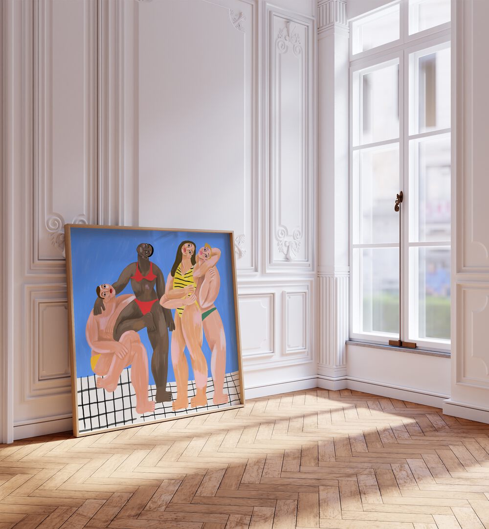 La Piscine By Cepe Wallart Prints in Oak Wood Plain Frame placed on a wooden floor beside a window