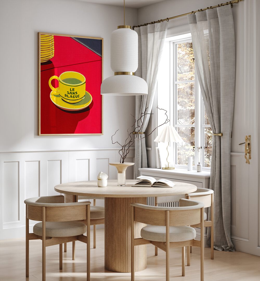 La Sans Blague by Studio Mandariini Kitchen Posters Kitchen Art Prints in Oak Wood Plain Frame placed on a wall in a dining room area beside a window and behind a dining table