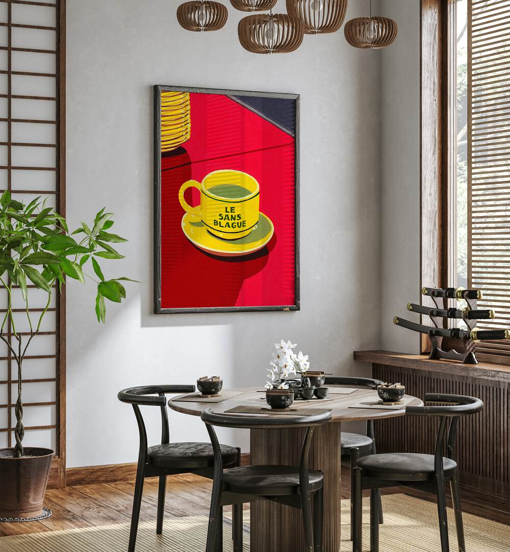 La Sans Blague by Studio Mandariini Kitchen Posters Kitchen Art Prints in Black Plain Frame placed on a wall in a dining room area behind a dining table and beside a window