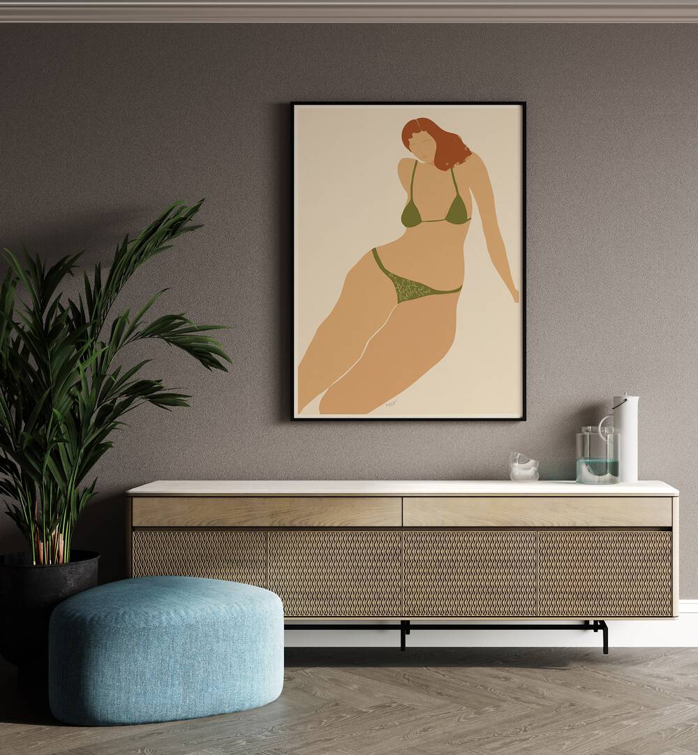 Lady Seashore By Andi Bell Beach Prints in Black Plain Frame on a grey wall placed above a console table