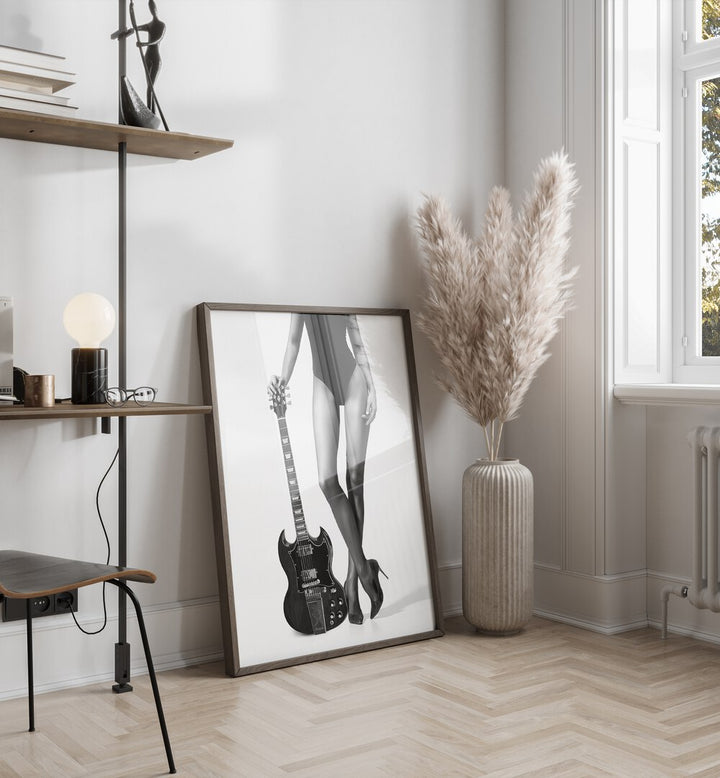 Lady With the Gibson by David Drake Fine Art Photography Fashion Photography in Black Plain Frame placed on the floor beside a window