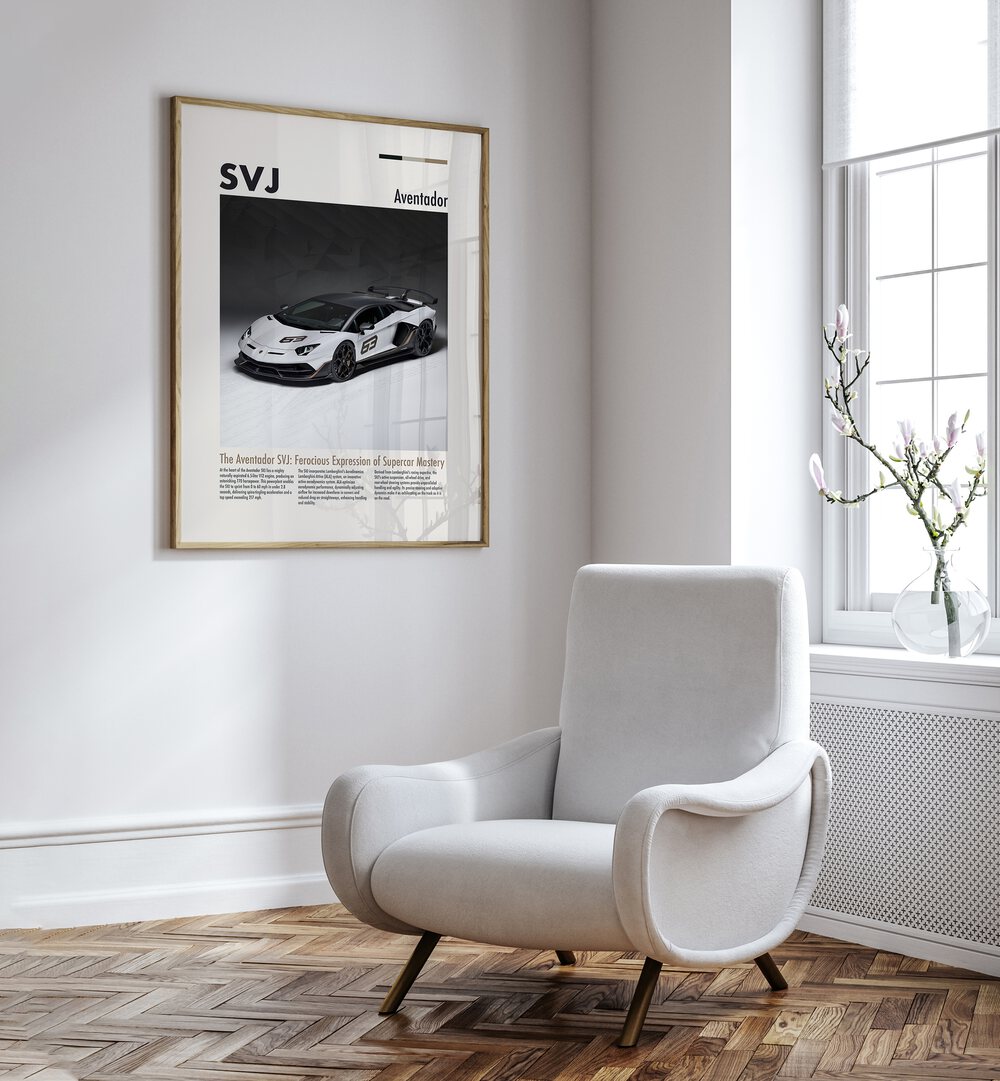 Lamborghini Aventador SVJ Car Posters Automotive Wall Art Prints in Oak Wood Plain Frame placed on a White Colored Wall near a White Sofa Chair in the Drawing Room