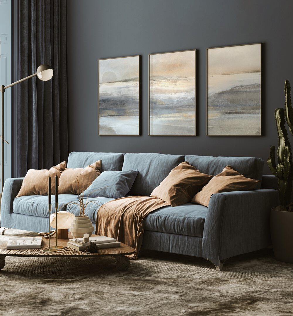 Landscape Abstraction Set Set Of 3 Paintings in Dark Wood Plain Frame placed on a living room wall behind a sofa