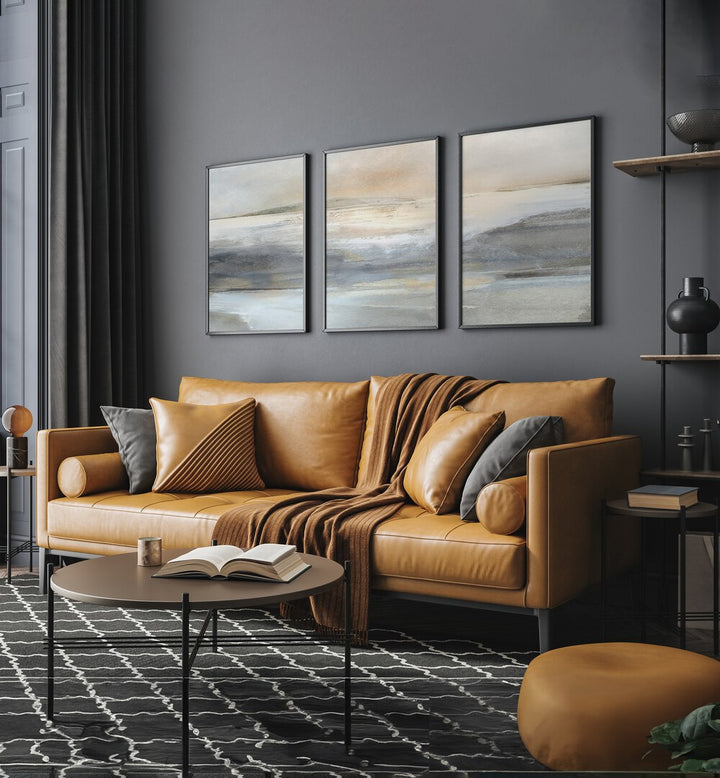 Landscape Abstraction Set Set Of 3 Paintings in Black Plain Frame placed on a living room wall behind an orange sofa and beside a window