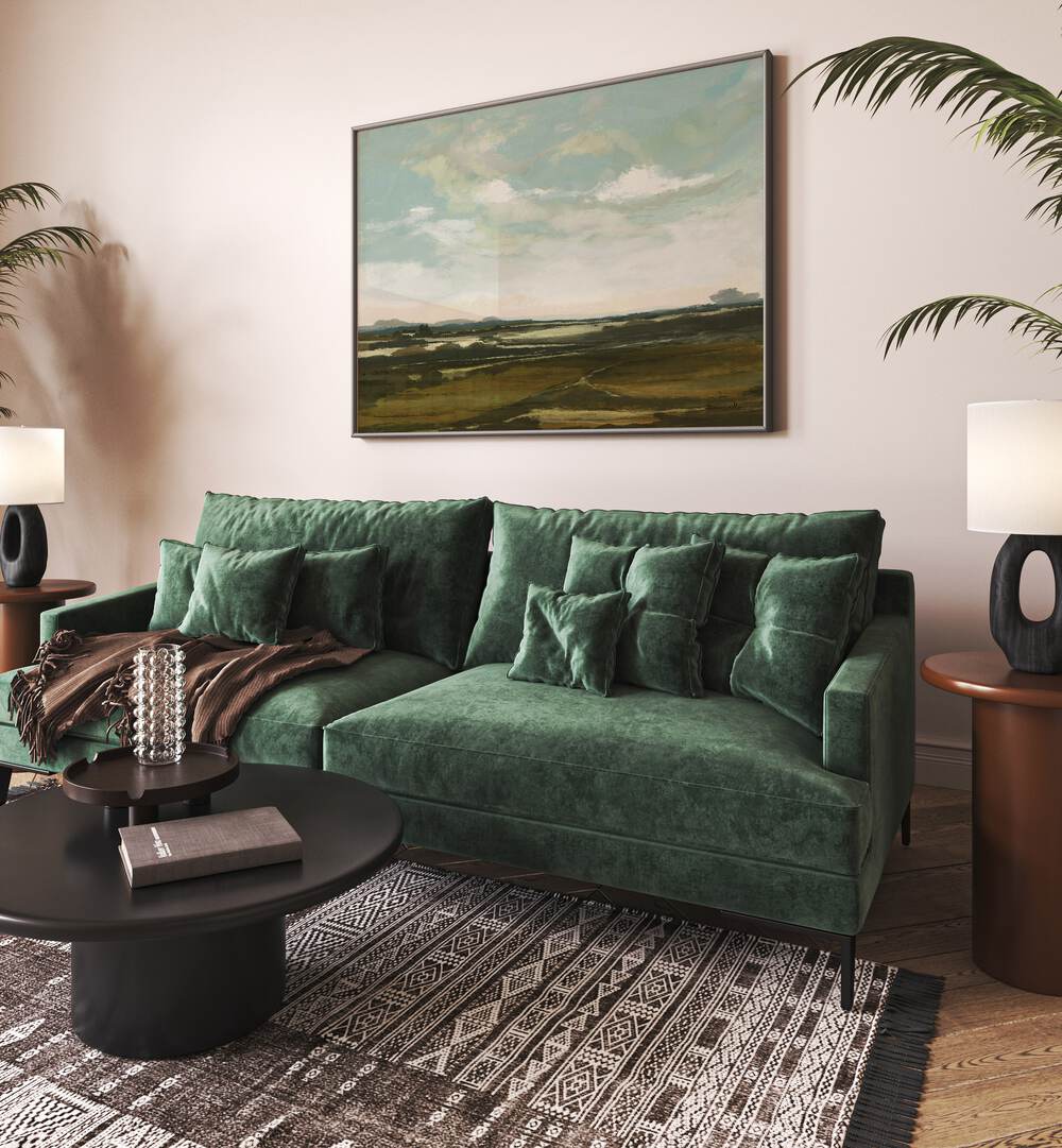 Landscape By Dan Hobday Landscape Art Prints Landscape Paintings in Black Plain Frame placed on a Cream Colored Wall near a Green Sofa in the Living Room