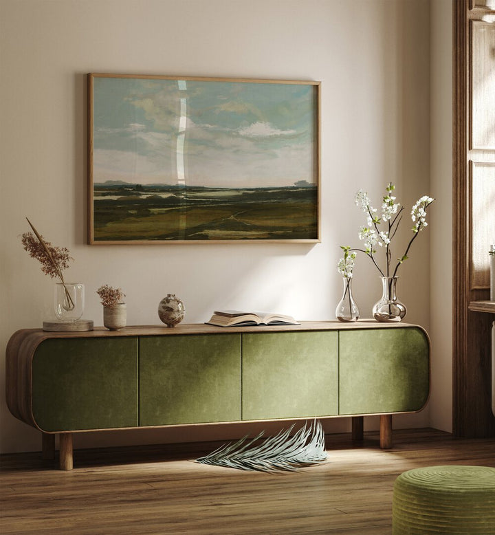 Landscape By Dan Hobday Landscape Art Prints Landscape Paintings in Oak Wood Plain Frame placed on a Cream Colored Wall above a Console Table in the Drawing Room