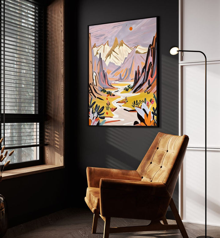 Lavender Mountains By Uma Gokhale Landscape Art Print in Black Plain Frame beside an orange sofa