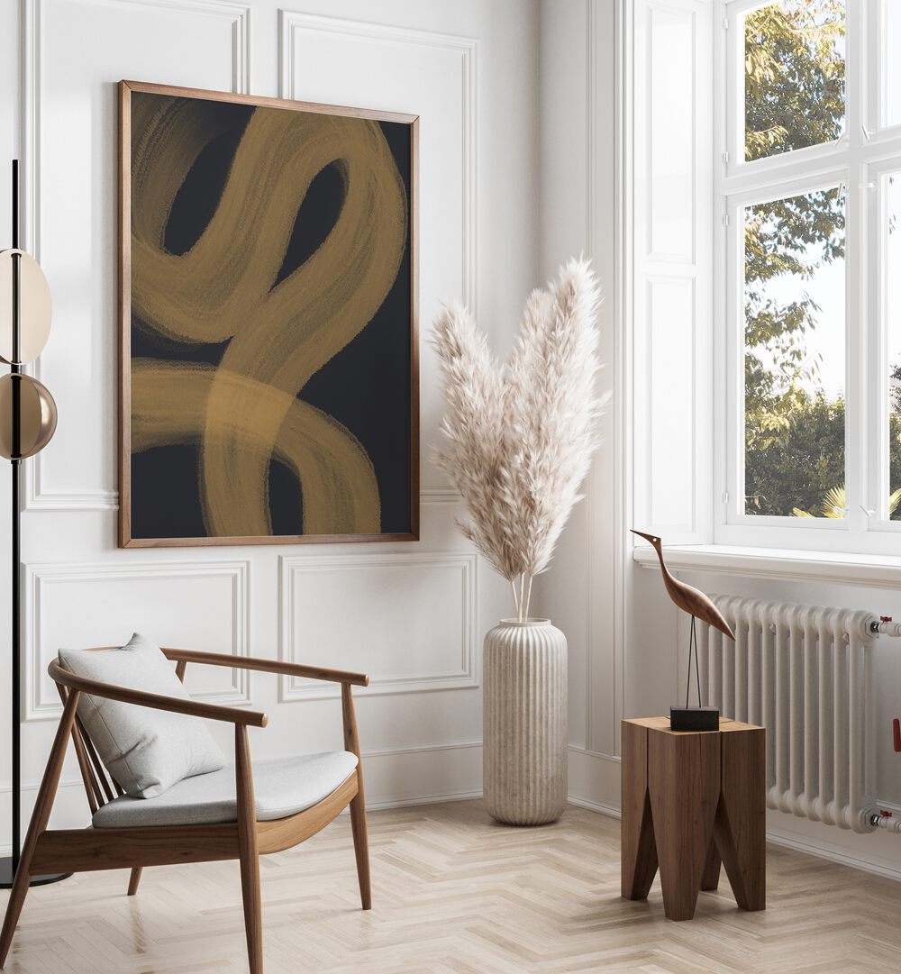 Laxius by Yopie Studio Abstract Paintings Abstract Art Prints in Oak Wood Plain Frame placed on a wall beside a window and behind a chair