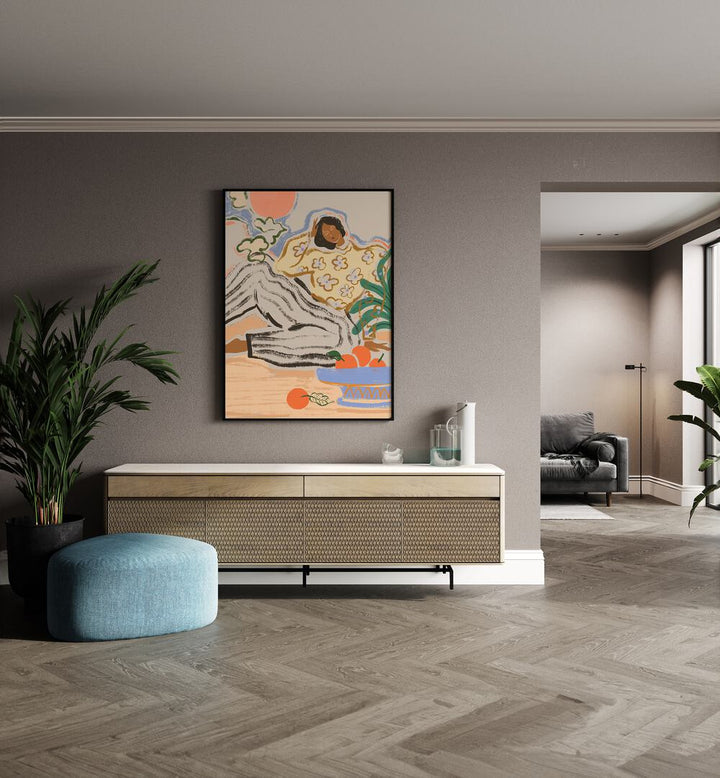 Lazy Days By Arty Guava Wall Art Prints in Black Plain Frame placed on a Beige Colored Wall above a Console Table in the Drawing Room