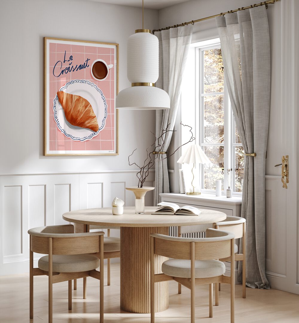 Le Croissant Cafe Art Prints Cafe Posters in Oak Wood Plain Frame placed on a White Colored Wall near a Coffee Table in the Dining Room